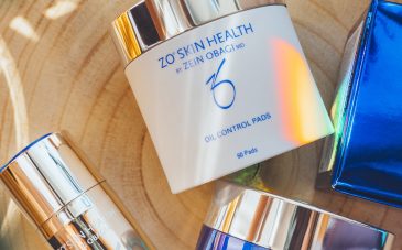Zein Obagi Zo Skin Health luxury cosmetic products for skincare, acne treatment - sunscreen spf, renewal pads, hydrating cleanser, preventing age toner, oil serum. Flat lay top view.